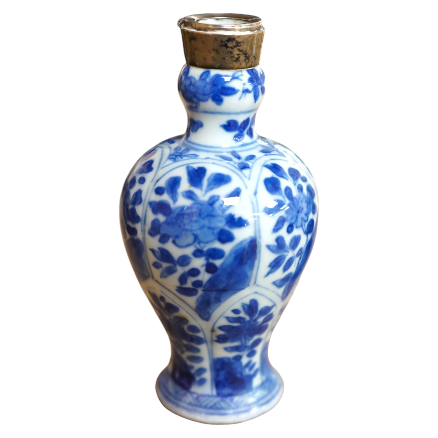 A Chinese small blue and white, white metal mounted vase, Kangxi, 12cm. Condition - poor to fair